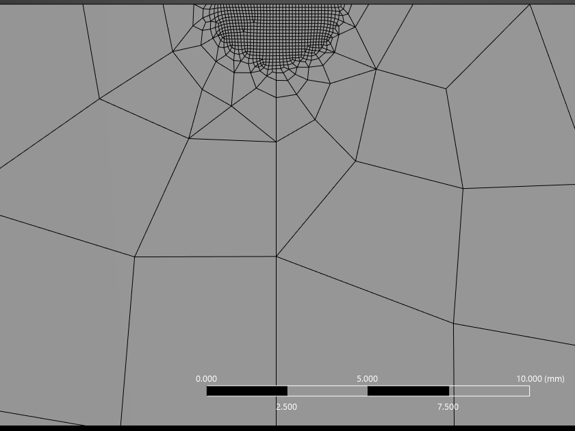 Mesh around the crack tip with 0.1 mm elements in a half circle, growing coarser outwards